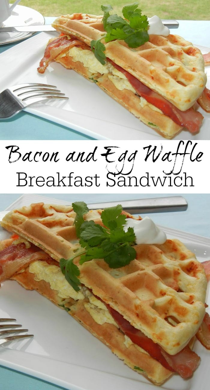 Rectangular white plate with a bacon and egg waffle breakfast sandwich and fork