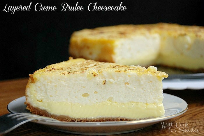 Creme Brulee Layered Cheesecake slice on a plate with a fork to the left