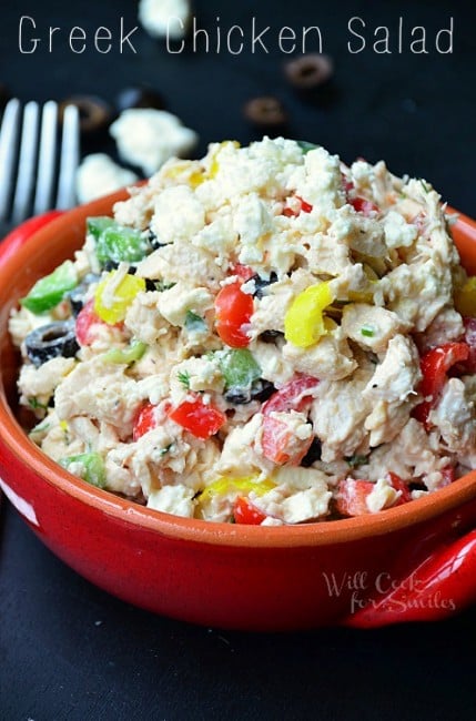 greek chicken salad with banana peppers, red peppers, and olives