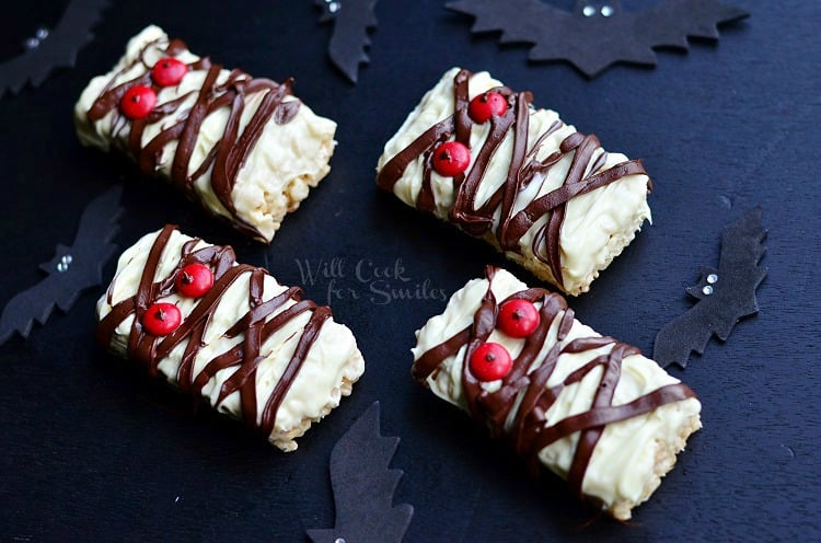 Rice Krispie Mummies with chocolate drizzle and red candy eyes