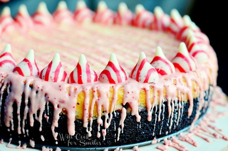 close up horizonal photo Peppermint Cheesecake with peppermint kisses along the outside and with Oreo Cake Crust