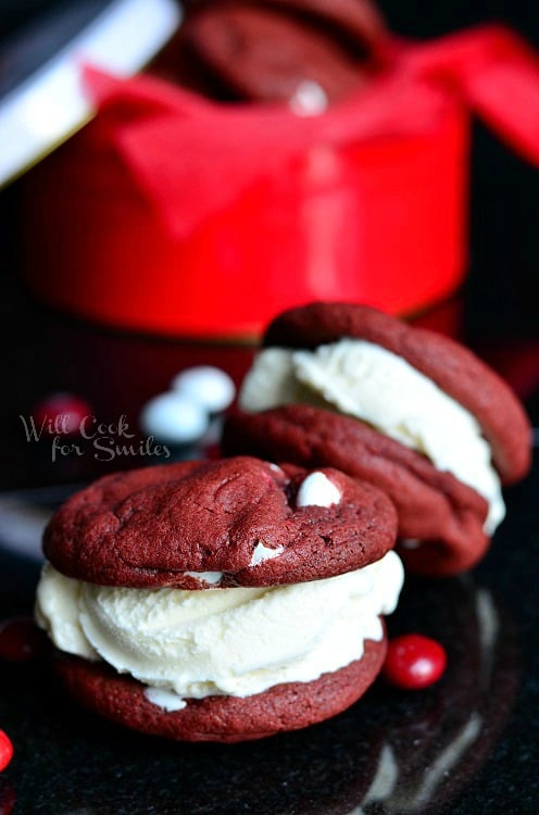 Red Velvet Ice Cream Sandwich Cookies on a black counter top