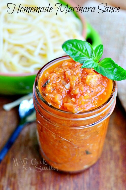 Homemade Marinara Sauce in a jar with some basil