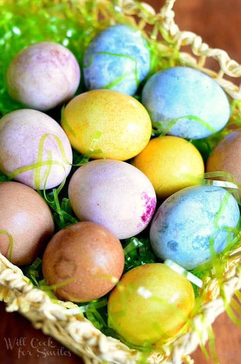 colored easter eggs in basket