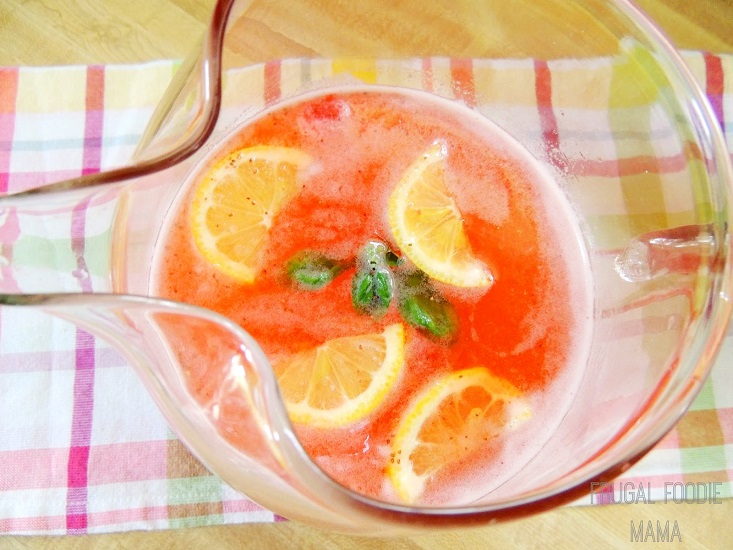 strawberry basil lemonade in a pitcher