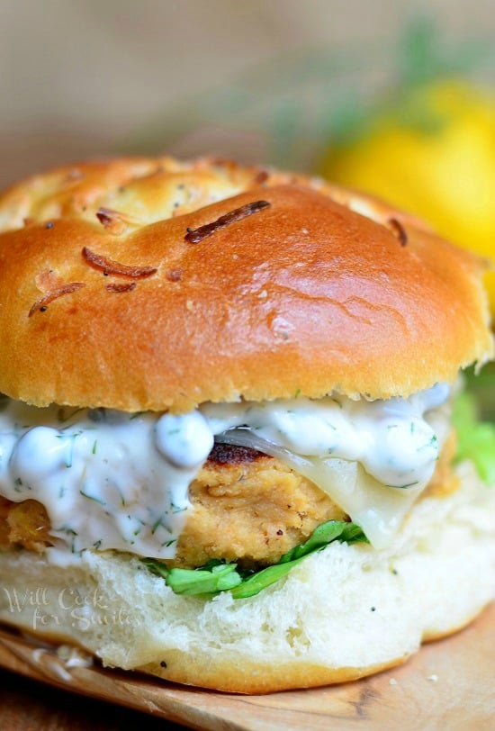 Salmon burger on a bun with sauce