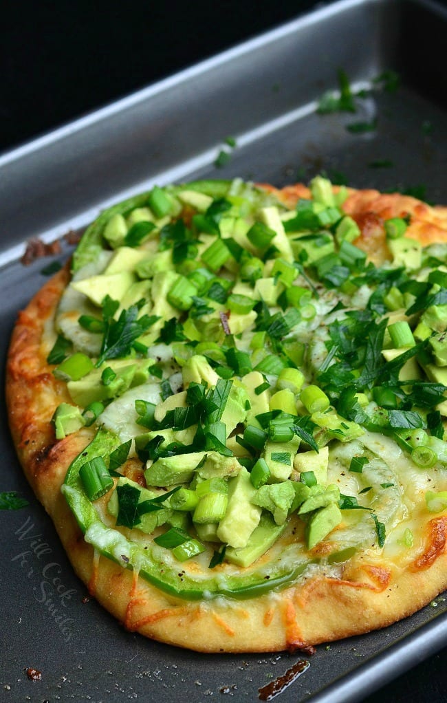 Green Naan Pizza on a baking pan