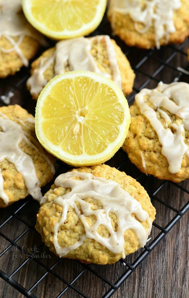 Oatmeal Cookies with a lemon glaze and a lemon in the middle on a cooling rack