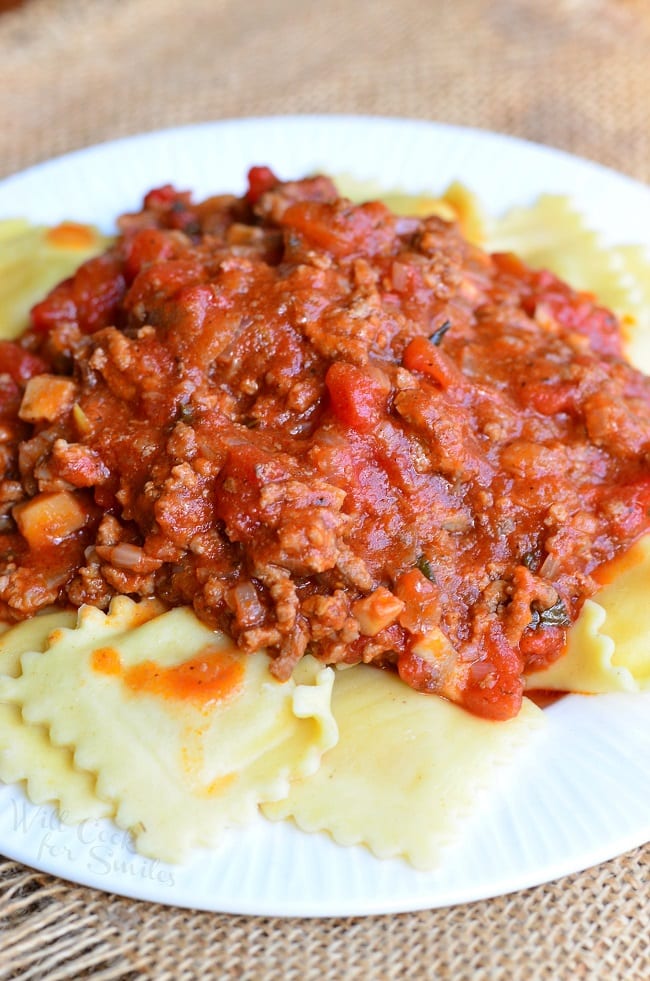Ravioli with Meat Sauce with on a white plate