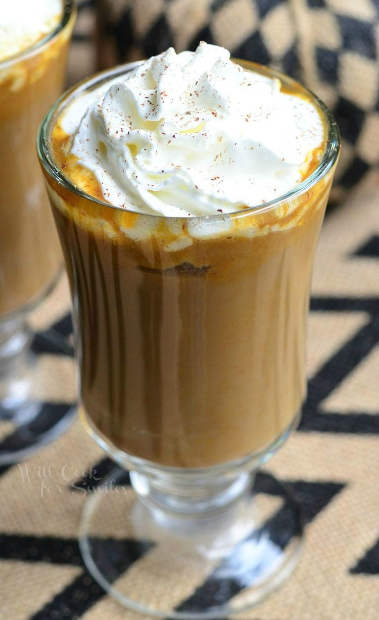 Pumpkin White Chocolate Mocha Latte with whipped cream on top