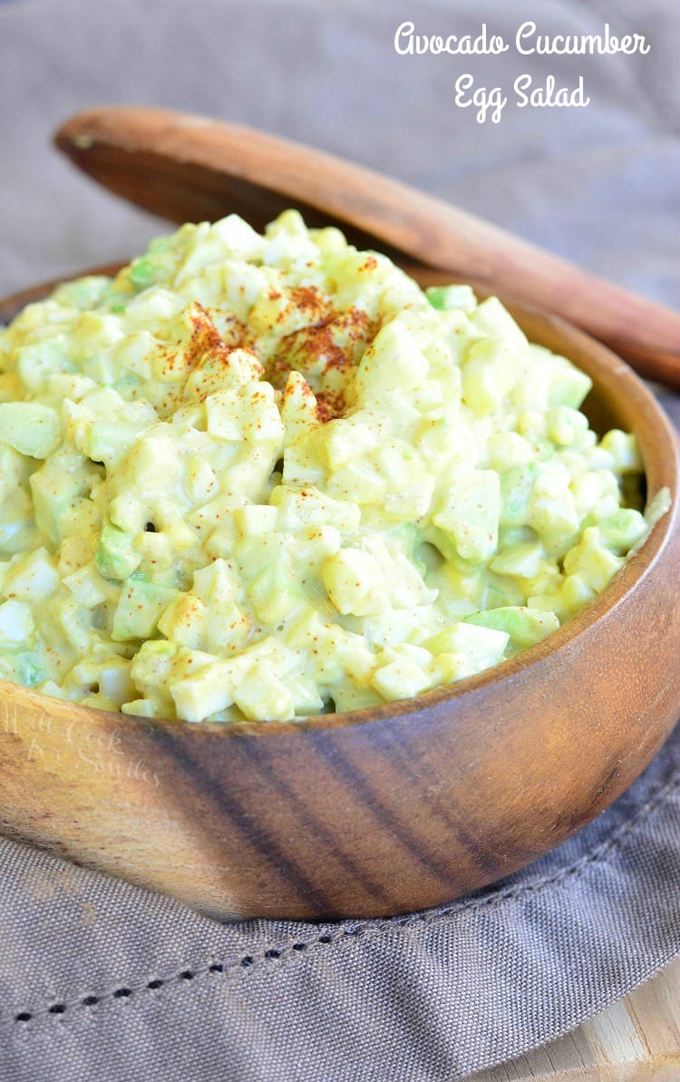 Avocado Cucumber Egg Salad in a wood bowl with a wooden spoon