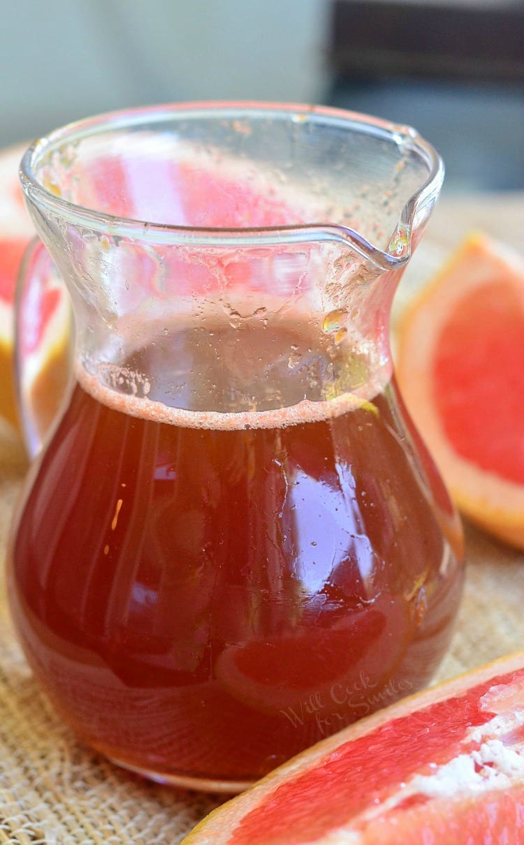 Homemade Grapefruit Syrup in a glass container