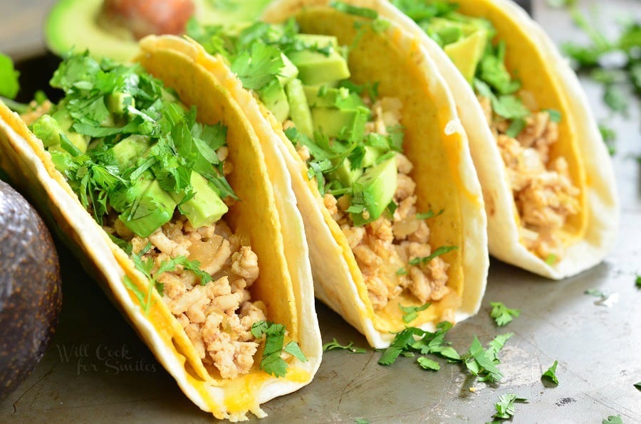 Avocado Turkey Tacos in a hard shell with ground turkey, avocado and cilantro