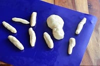 Raw dough shaped like spider parts