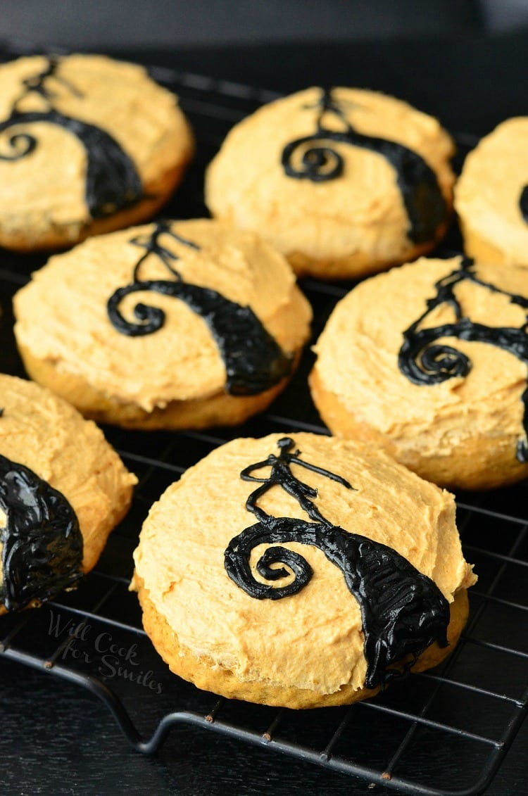 The Nightmare Before Christmas Cookies. Orange frosted cookies some with Jack on a cooling rack