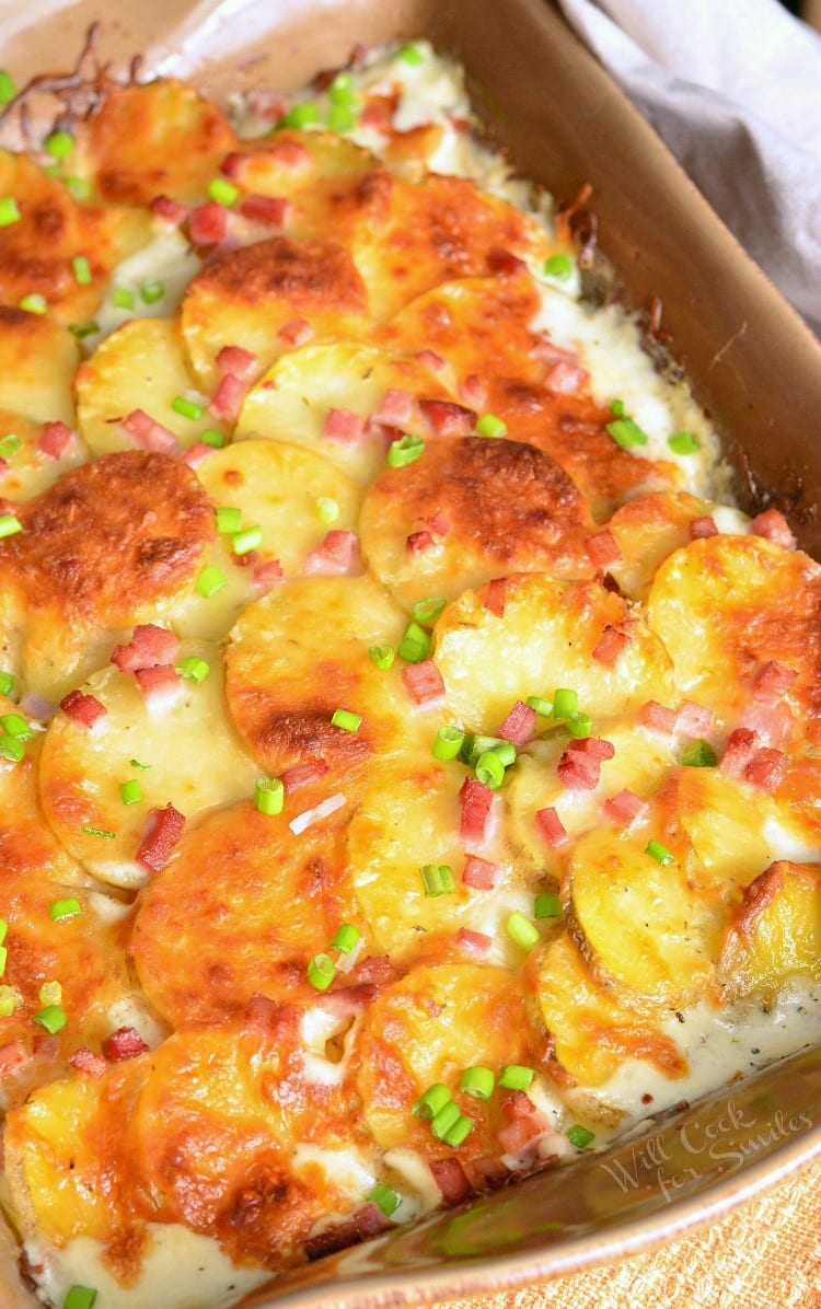 Top view of Chicken Cordon Bleu Scalloped Potatoes in a brown casserole dish