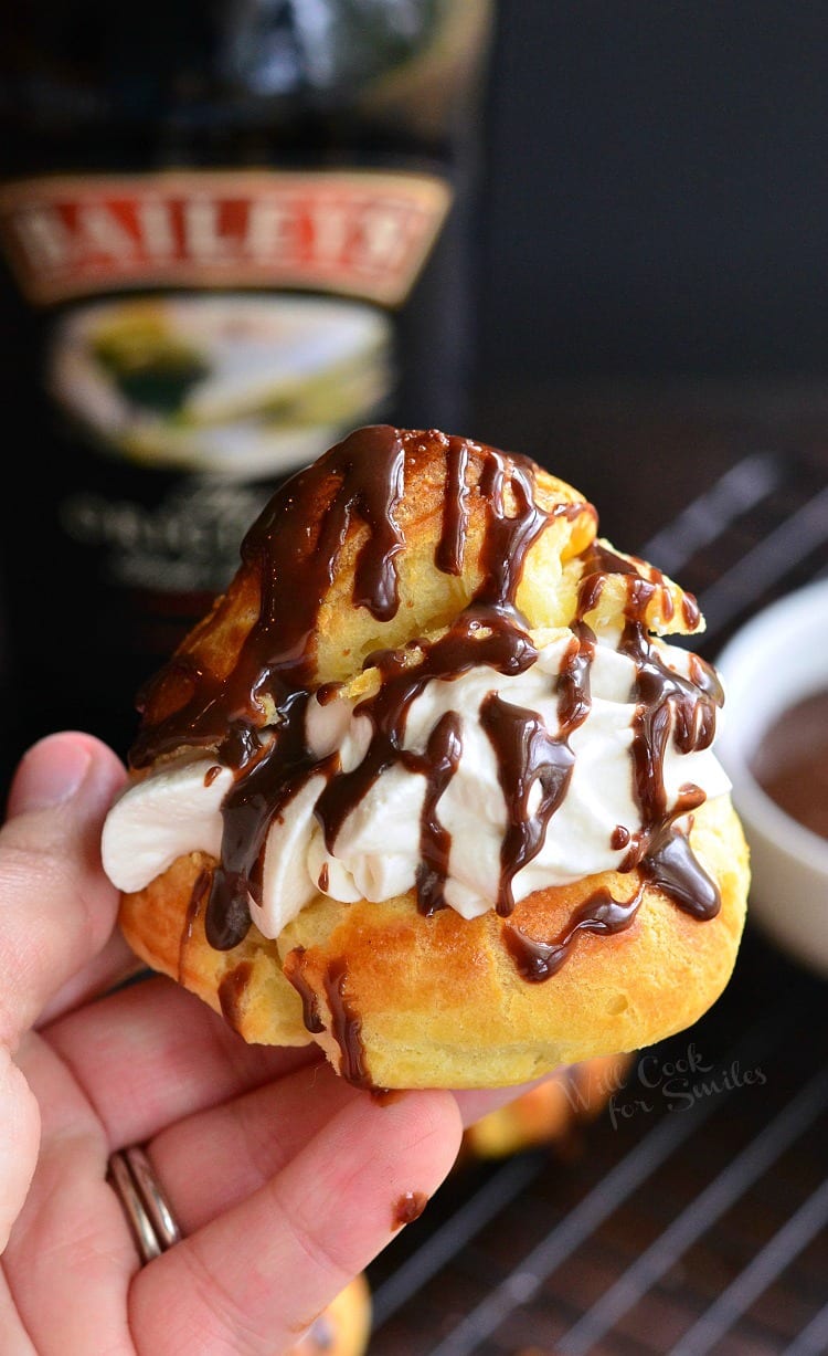 holding a Baileys Cream Puff