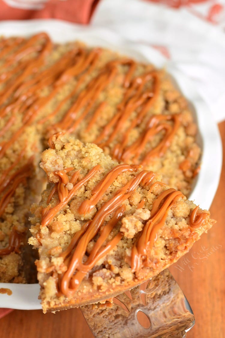 top view of Caramel Apple Cookie Crust Pie with a piece being lifted out with a pie spatula