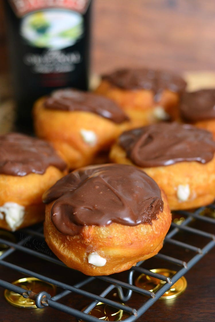 Bailey's Cheesecake Doughnuts on a cooling rack
