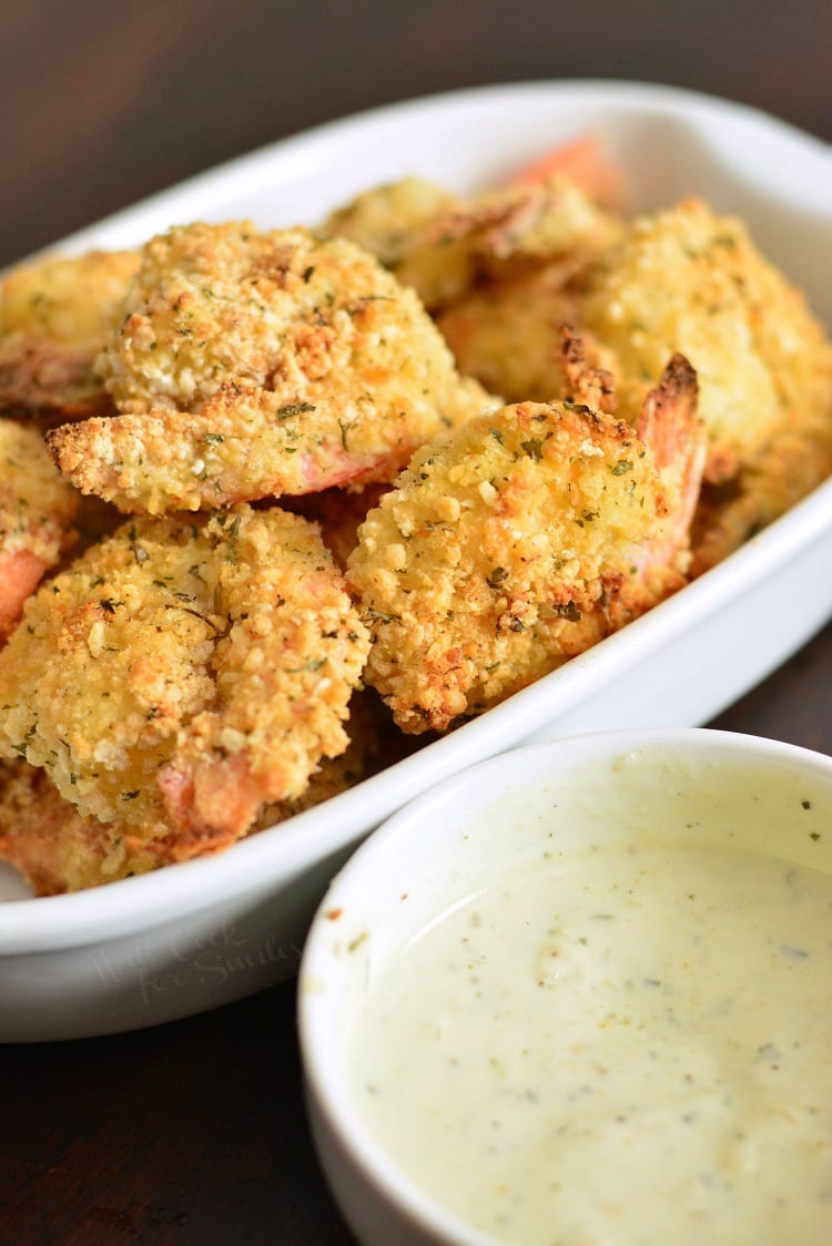 Oven Baked Crispy Parmesan Garlic Shrimp on a serving platter with a bowl of ranch