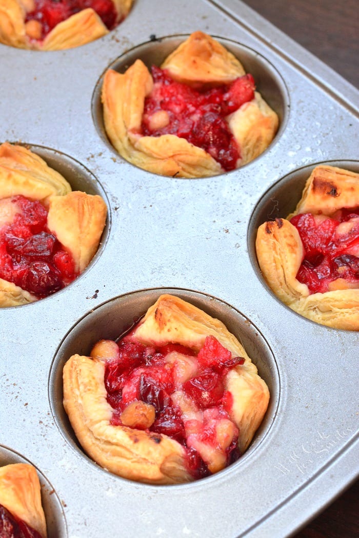 Apple Cranberry Brie Baked In Puff Pastry in a muffin tin