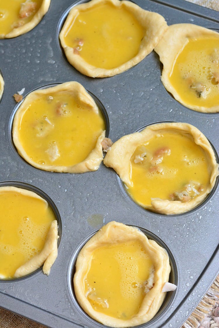 Leftover Turkey Breakfast Egg Muffins filling unbaked in a muffin tin