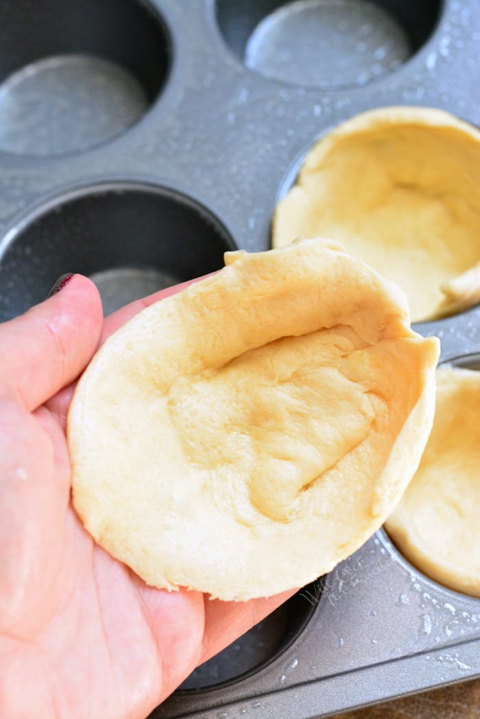 Breakfast Egg Muffin dough in a muffin tin
