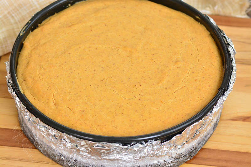 baked cheesecake on a wood cutting board