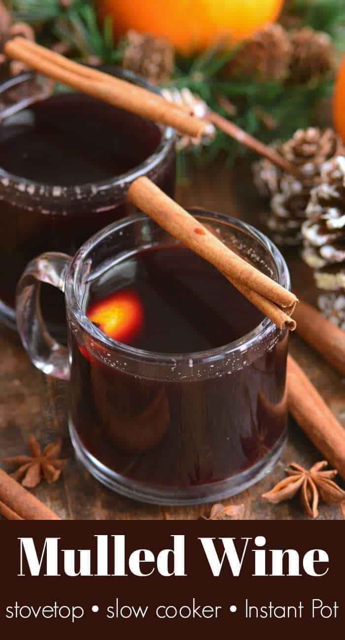 mulled wine in glass mug with cinnamon stick on top of glass