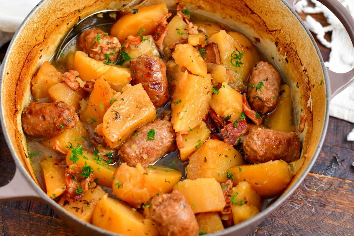 A pot full of baked Dublin Coddle is ready to be served.