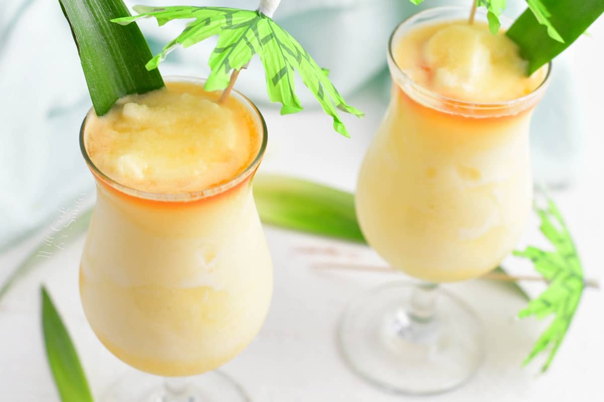 Two glasses are garnished.