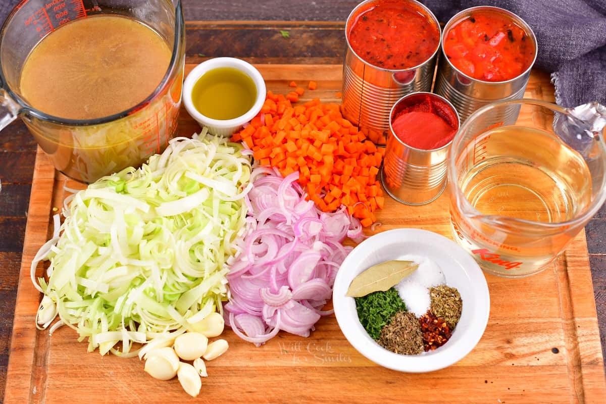 ingredients to make Cioppino on the cutting board.