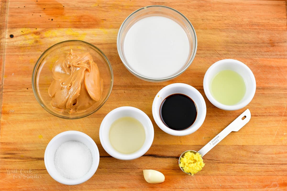 ingredients for peanut sauce on a cutting board