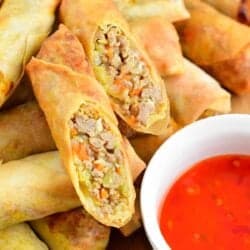 cut Thai spring roll on layer of spring rolls