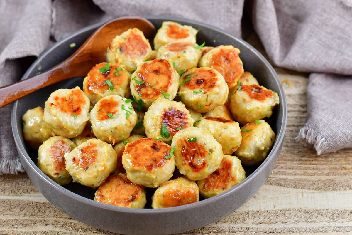 buttery chicken meatballs in a grey bowl