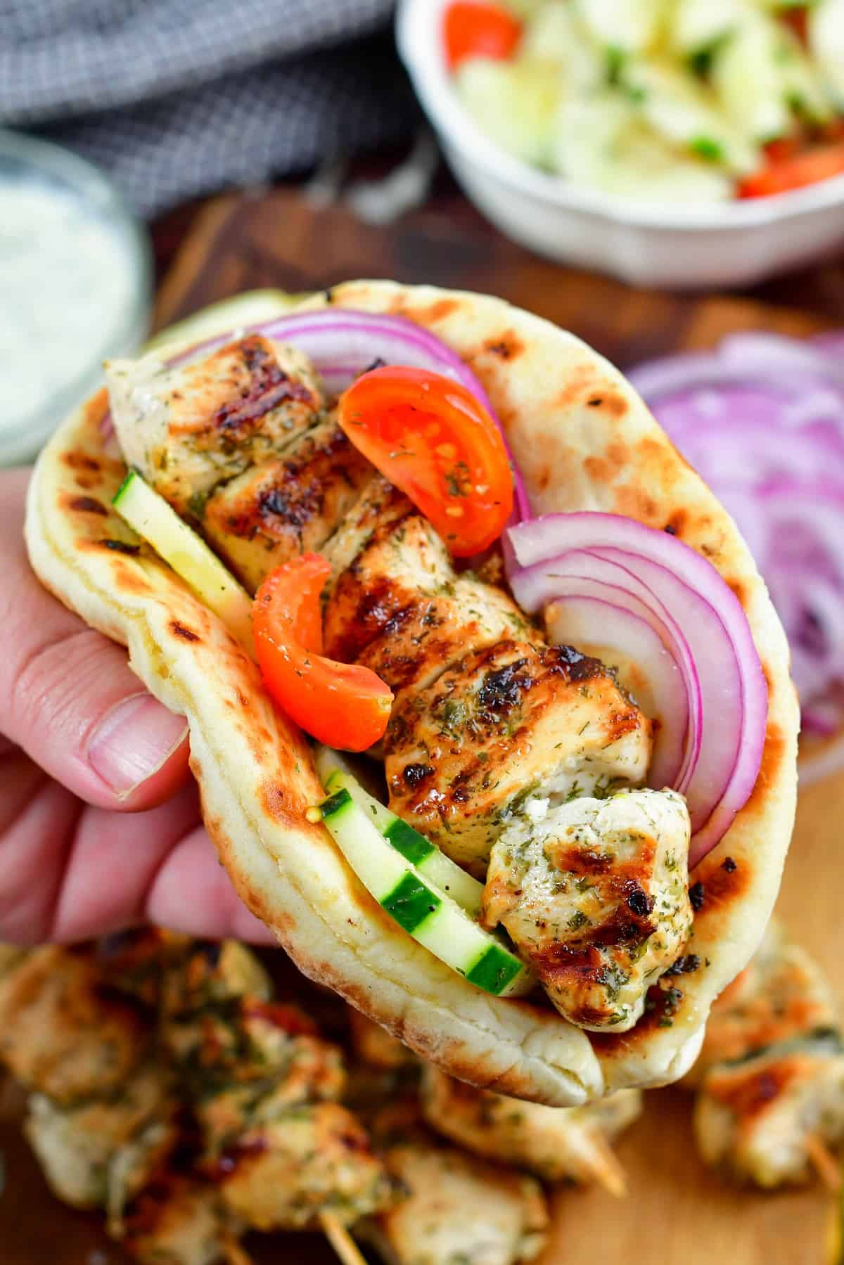 grilled chicken souvlaki in a pita with veggies