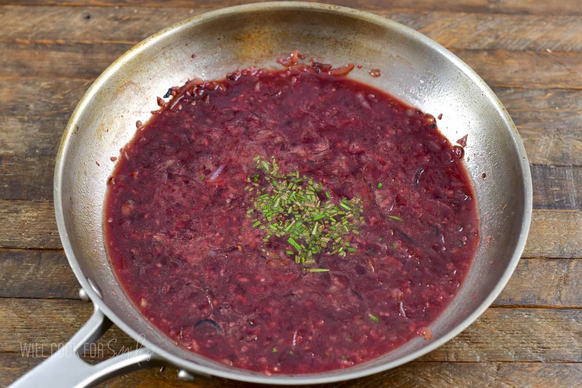 cooked sauce in the stainless steel cooking pan.