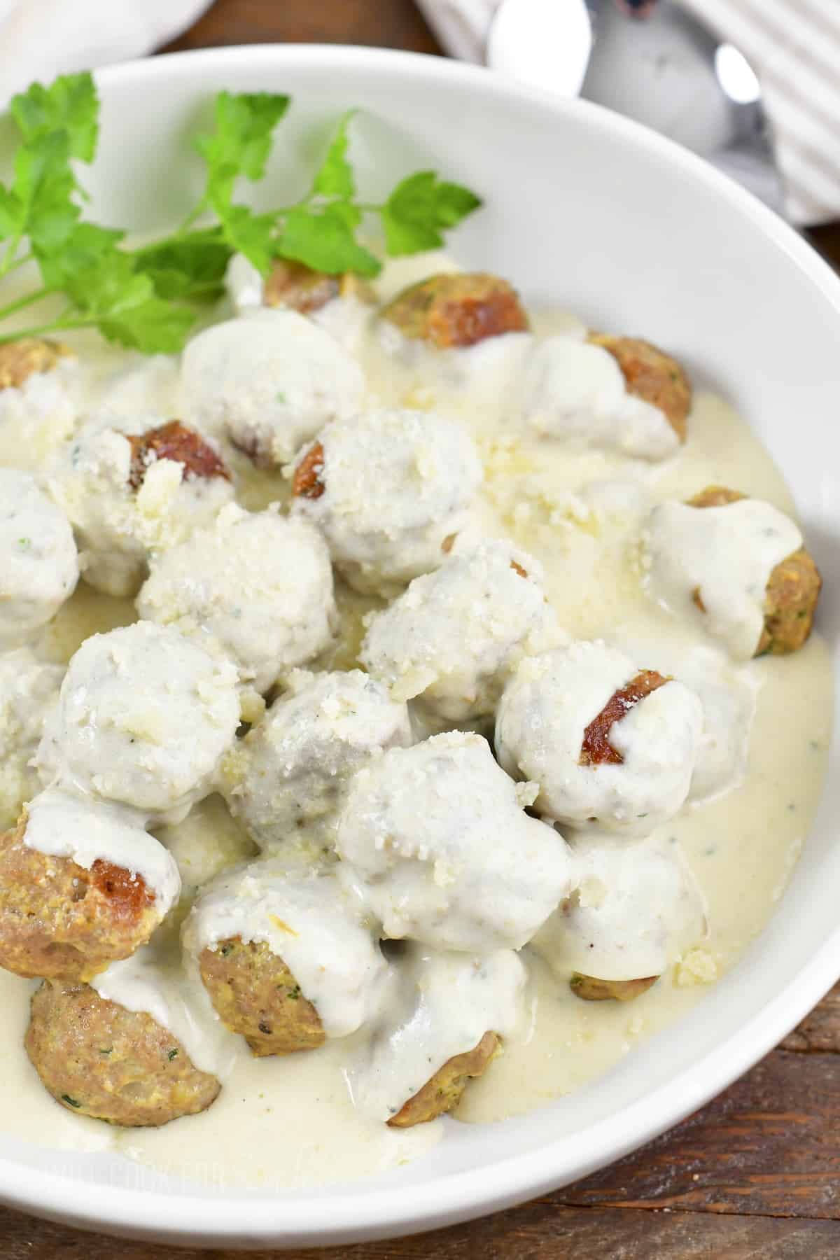 top view of turkey meatballs in creamy sauce.