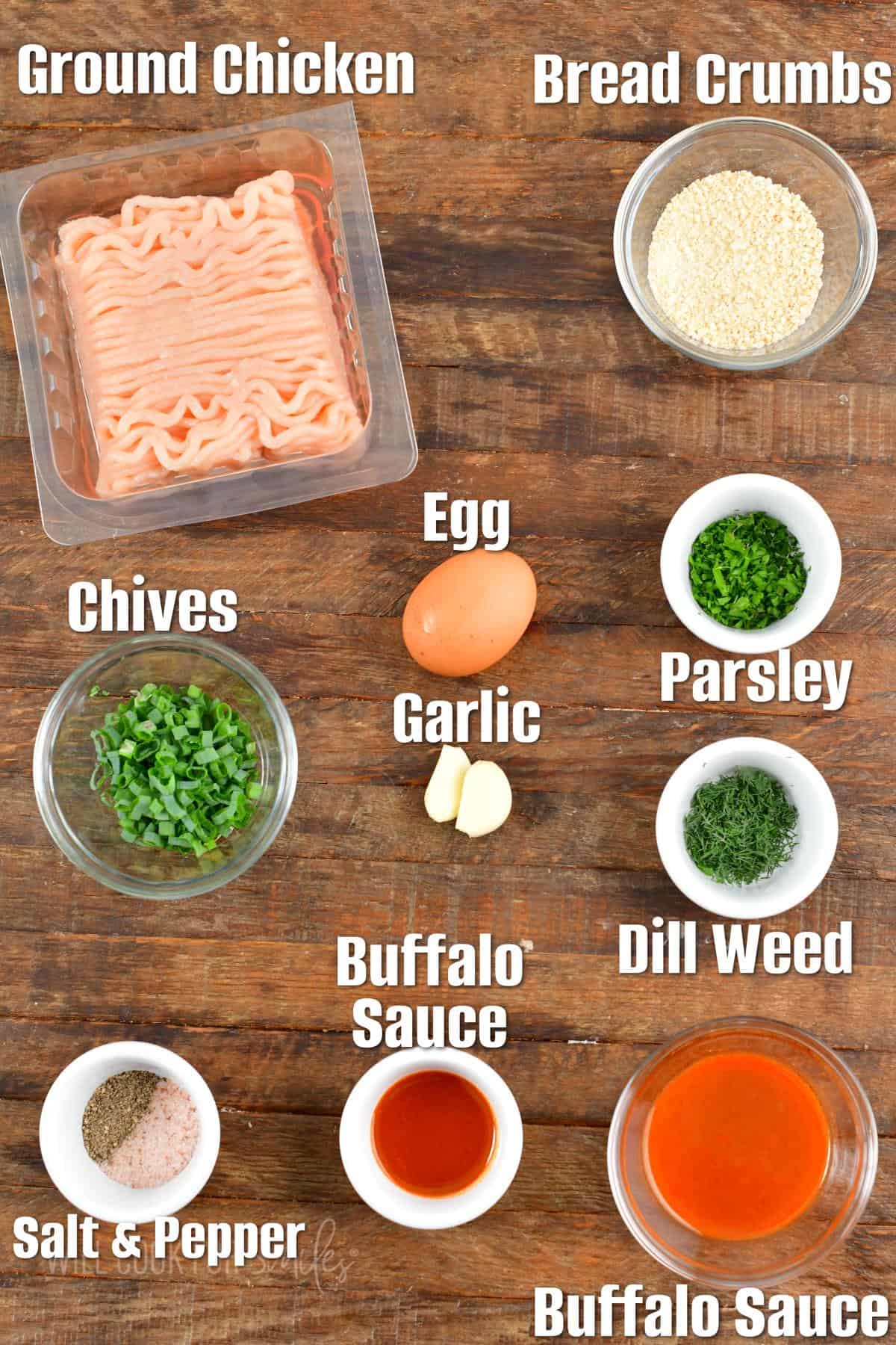 The ingredients for buffalo chicken burgers are placed on a wooden surface.