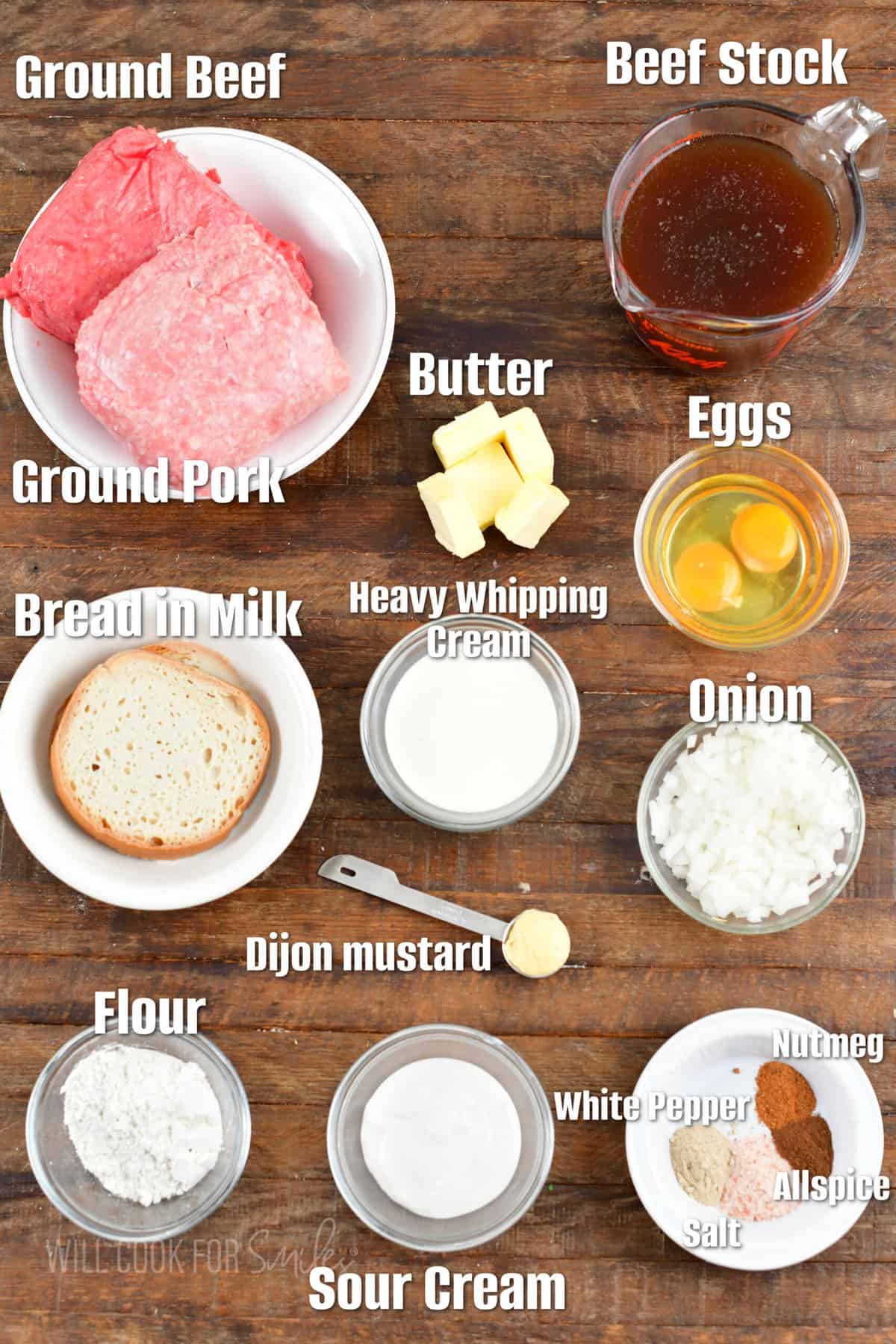 The ingredients for swedish meatballs are placed on a wooden surface.