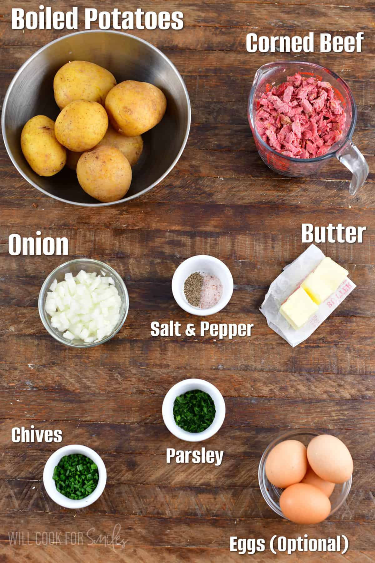 Labeled Corned beef hash ingredients on a wood surface.