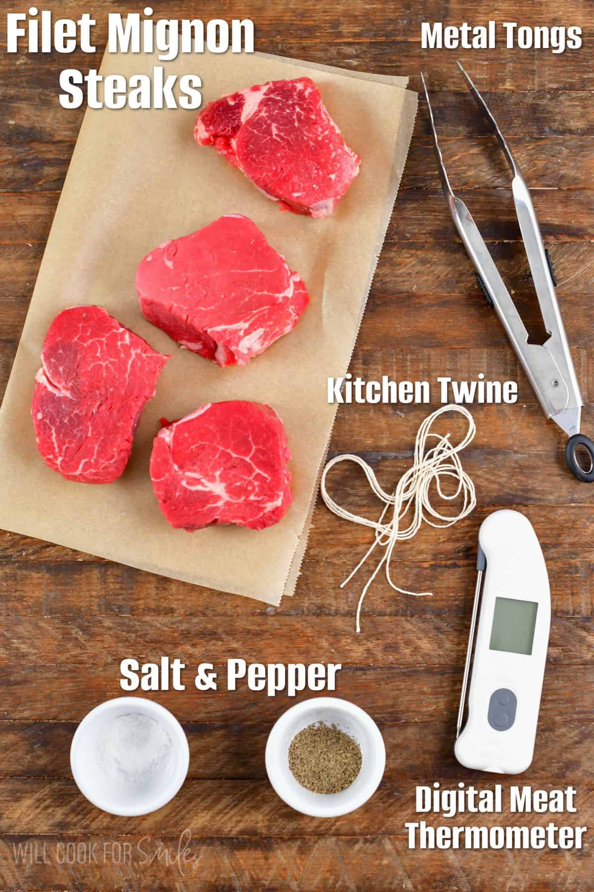 labeled ingredients and tools to cook filet mignon steaks at home.