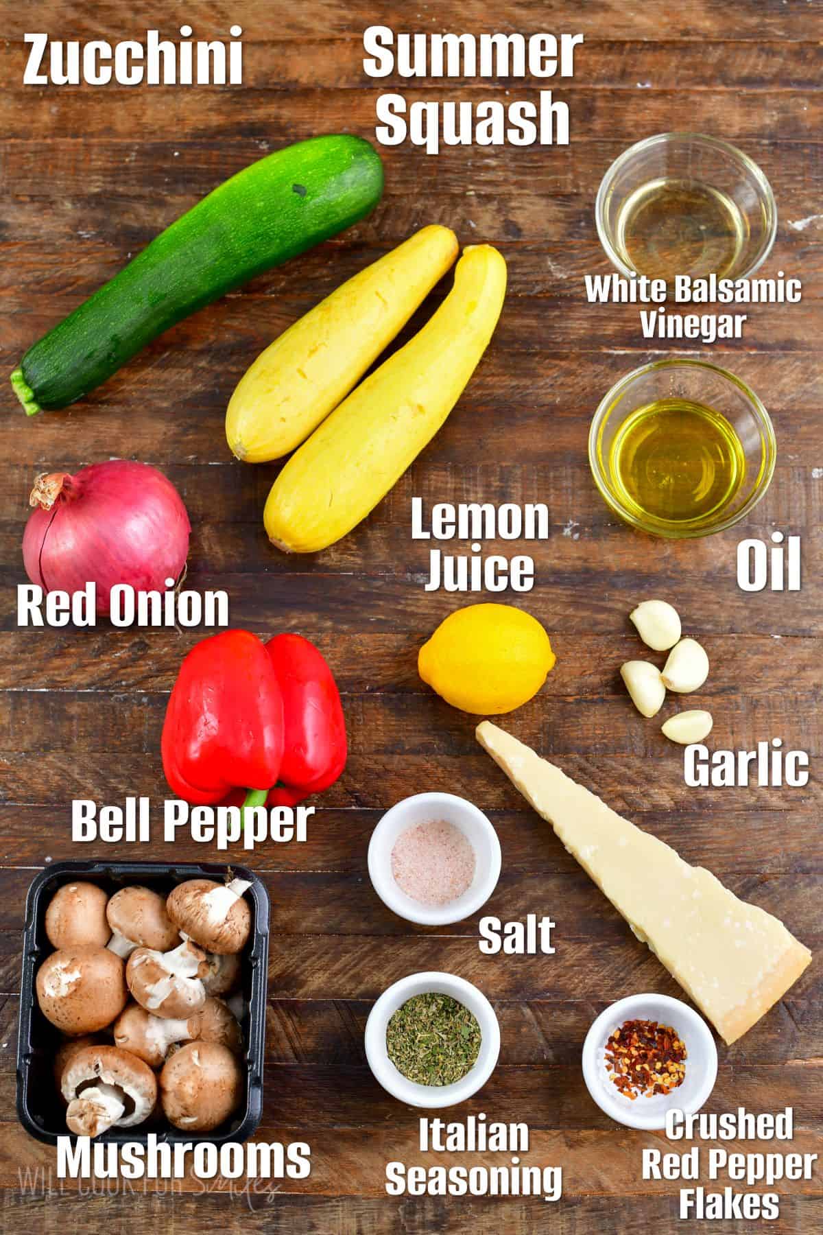 Labeled ingredients for Italian Grilled Vegetables on a wood cutting board.