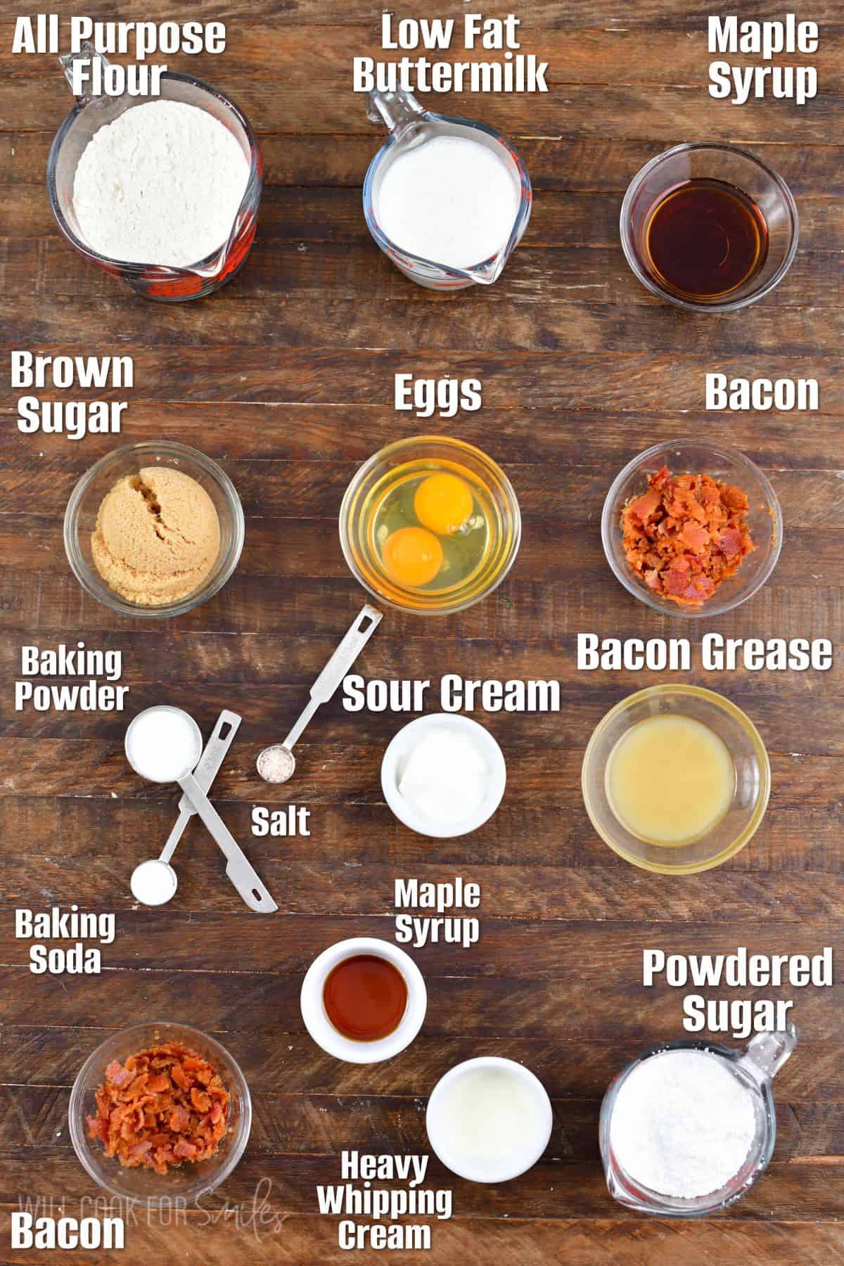 Labeled ingredients for maple bacon donuts on a wood surface.