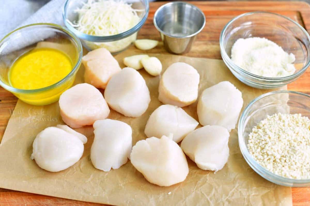 ingredients for baked scallops spread on the baking dish.