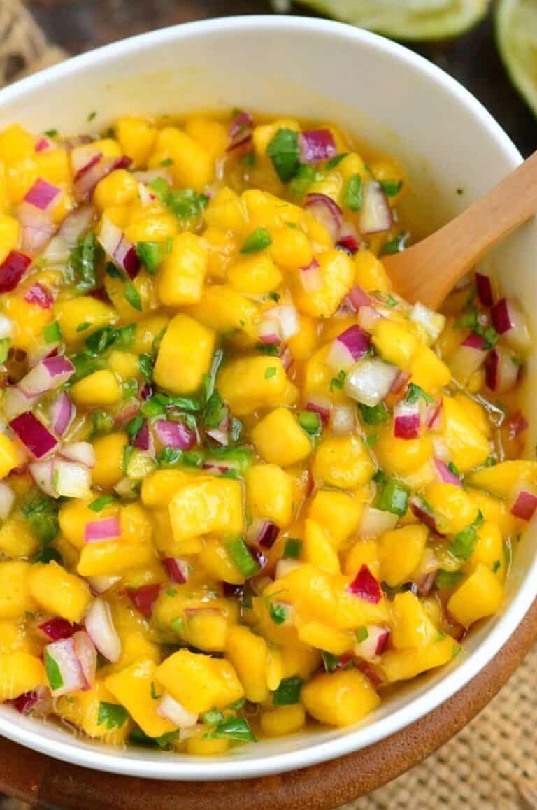 mango salsa with red onion and jalapeno in a bowl.