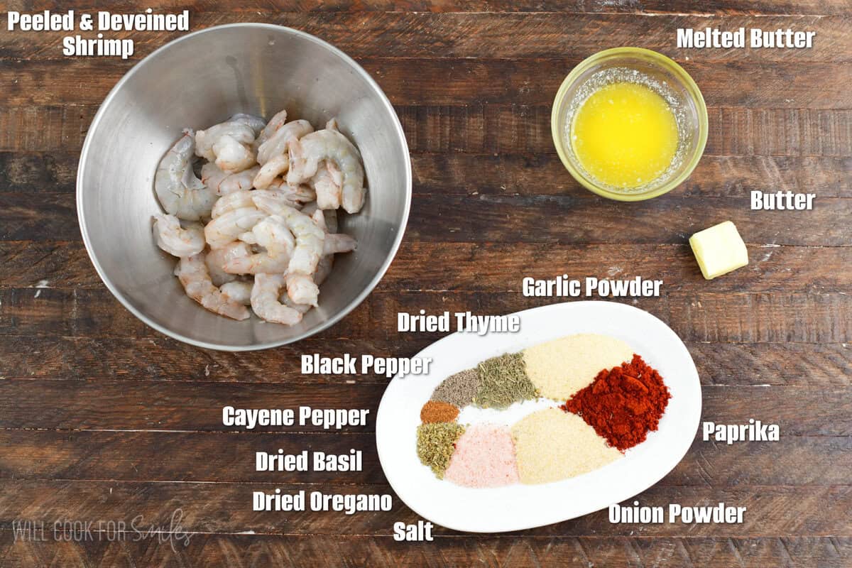labeled ingredients for blackened shrimp on the wooden background.