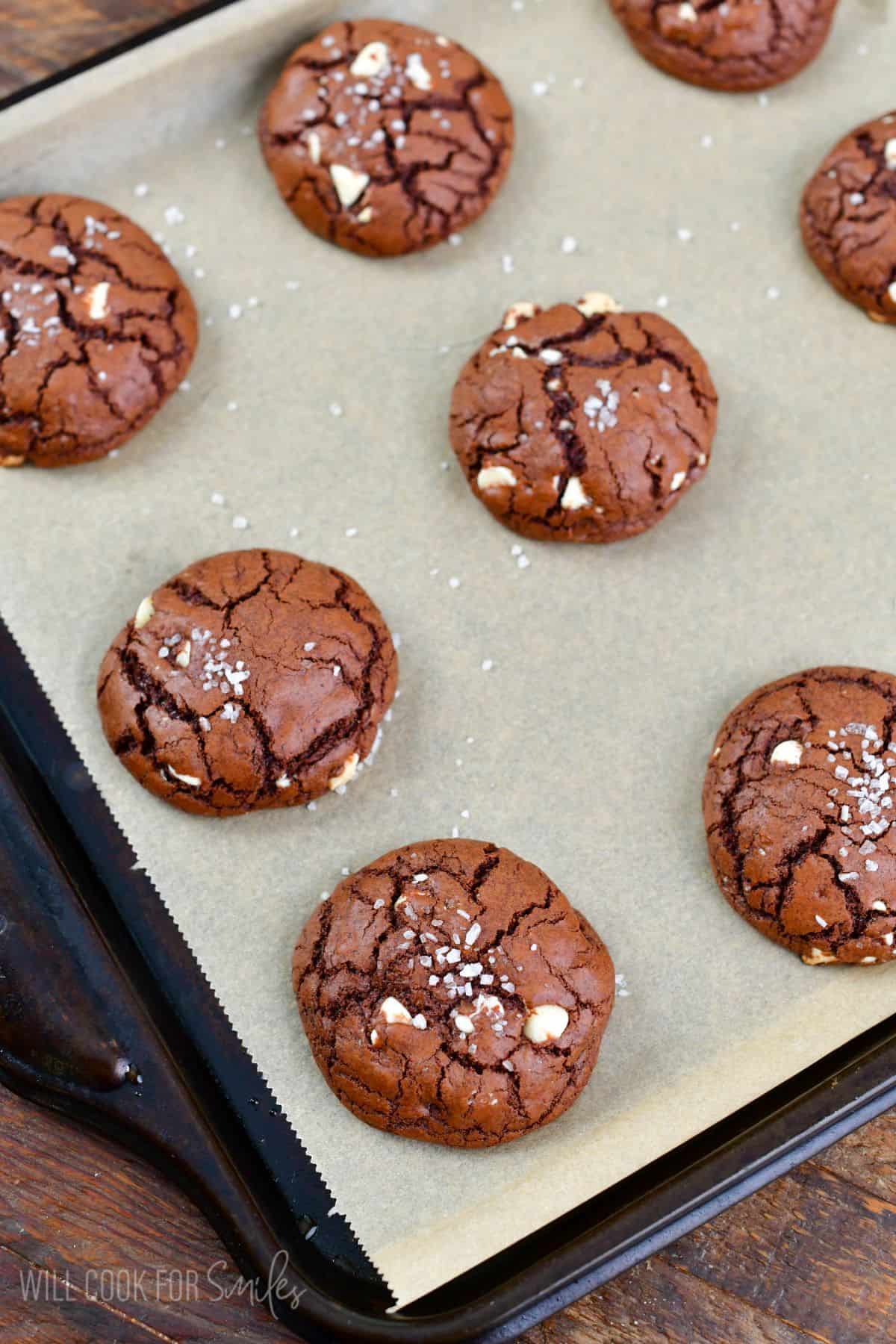 baked crinkled soft and chewy chocolate brown butter cookies with some salt on top.